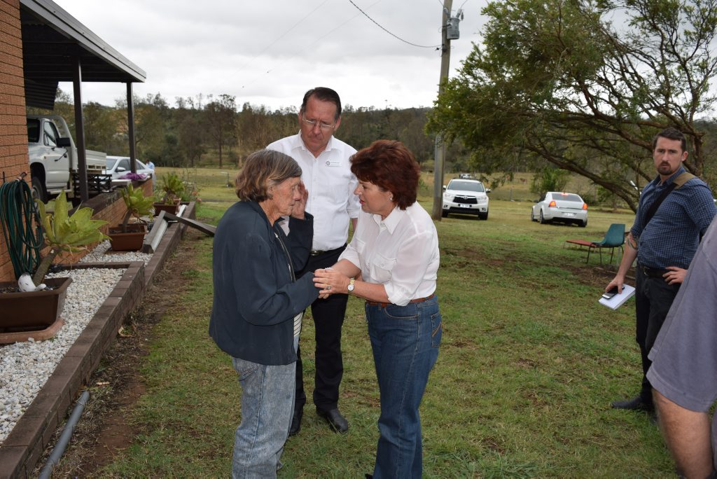 WE’RE WITH YOU: State MPs Jo-Ann Miller and Jim Madden comfort Rhonda McCulkin after the storm ripped her house apart. WE’RE WITH YOU: State MPs Jo-Ann Miller and Jim Madden comfort Rhonda McCulkin after the storm ripped her house apart.